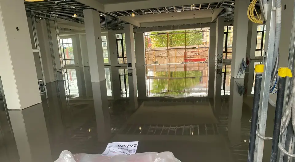 Finished flat self-leveling concrete floor in a large commercial space